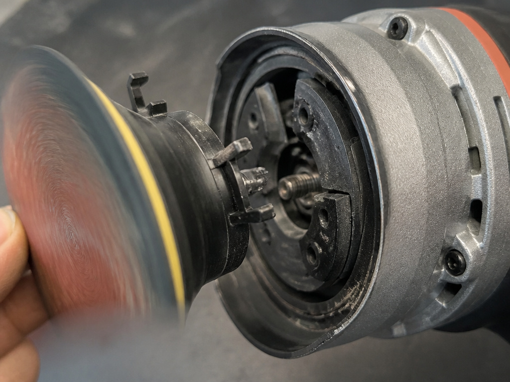 Dangerous platen separation defect on a recalled random orbital sander.